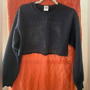Counterparts cropped black pull over band sweatshirt size small.